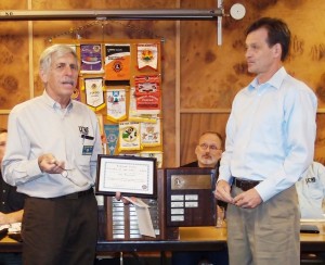 John Wieczorek, at right, accepts the Citizen of the Year award from the Ashland Lions Club