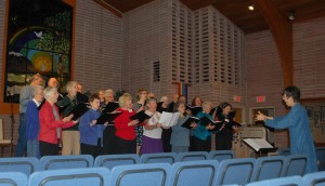 RVUUF choir members singing in RVUUF's Great Hall